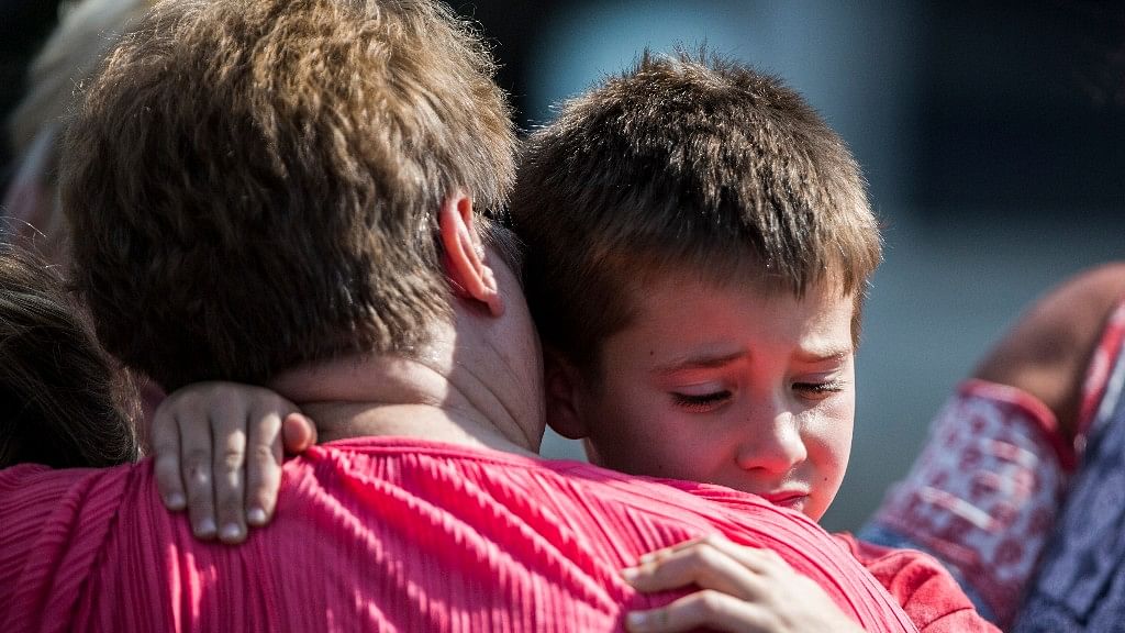 A woman hugs a boy following a shooting at Townville Elementary in Townville on Wednesday. (Photo: AP)