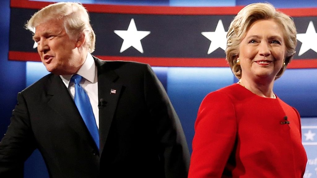 Republican US presidential nominee Donald Trump and his  Democratic rival  Hillary Clinton at the start of their first presidential debate. (Photo Courtesy: Reuters)