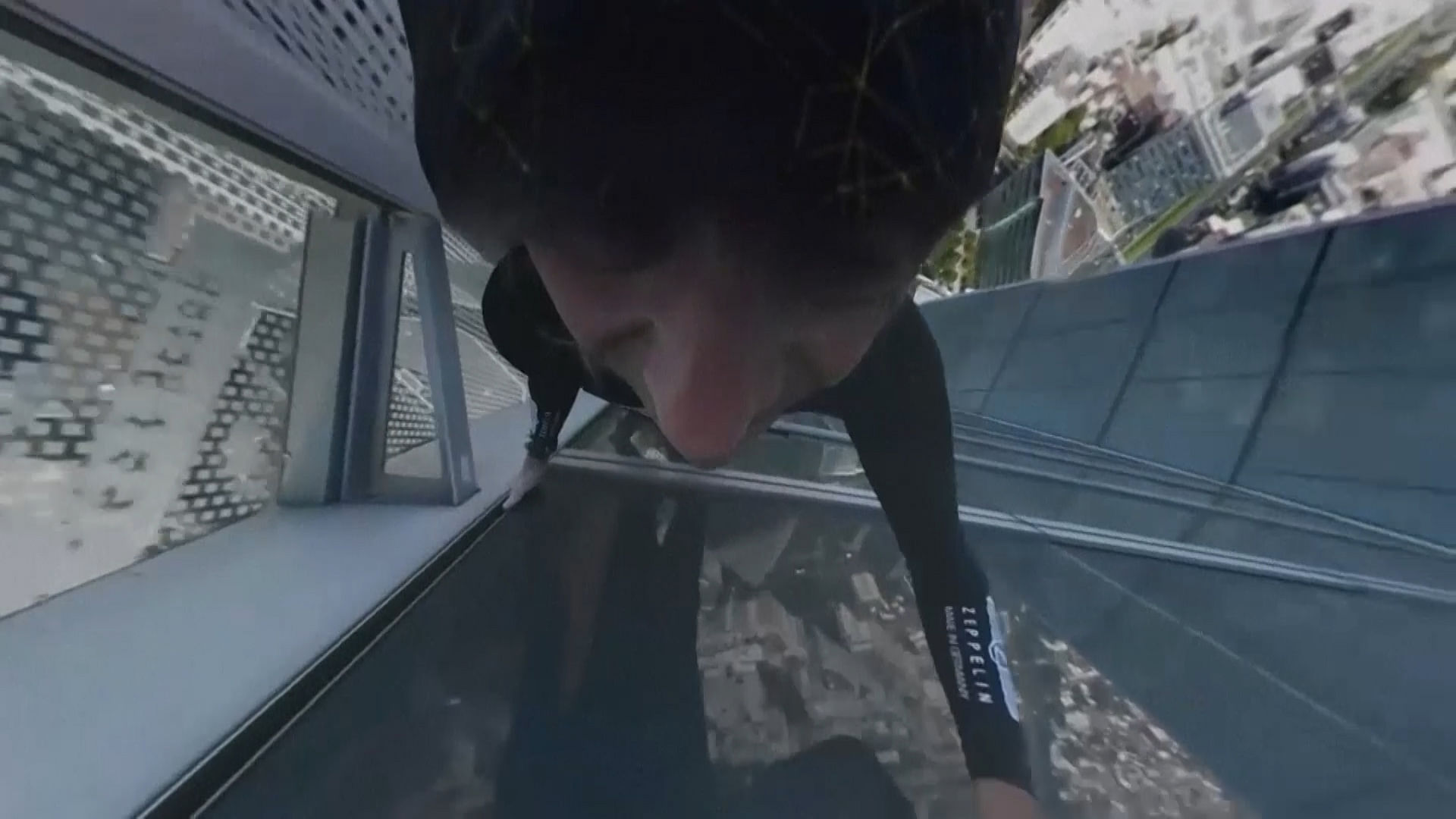 Alain Robert scaled an 185 metre (600 foot) high skyscraper in the business district of La Defense, outside Paris on Wednesday. (Photo: AP/ALAIN ROBERT HANDOUT screengrab)