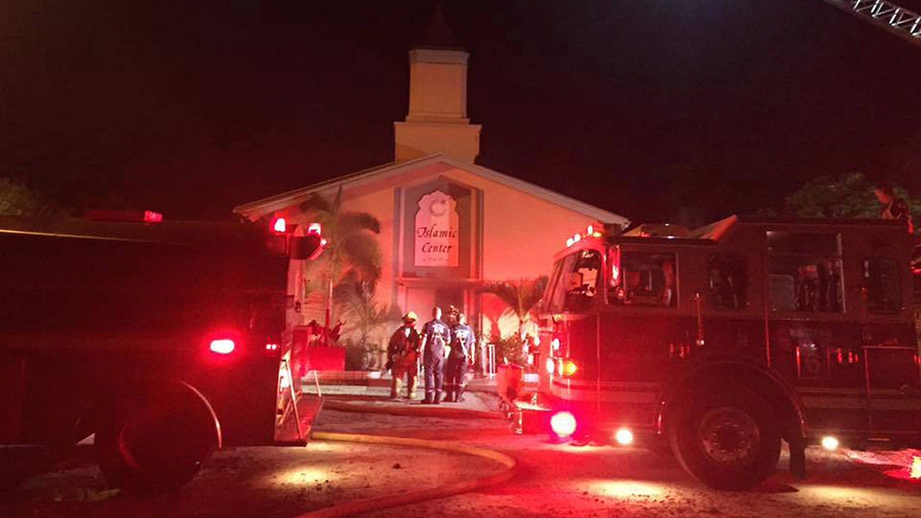 Firefighters work at the scene of a fire at the Islamic Center of Fort Pierce on Monday. (Photo: AP)