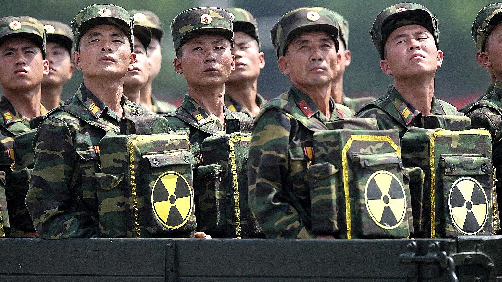 In this July 27, 2013, file photo, North Korean soldiers turn and look towards their leader Kim Jong Un during a ceremony marking the 60th anniversary of the Korean War armistice in Pyongyang, North Korea. (Photo: AP)