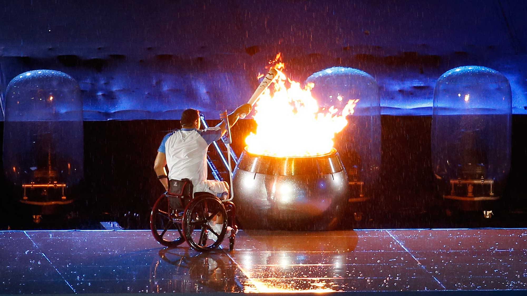 Brazilian athlete Clodoaldo da Silva lights the olympic flame during the opening ceremony of the Rio 2016 Paralympic Games at Maracana Stadium. (Photo: AP)