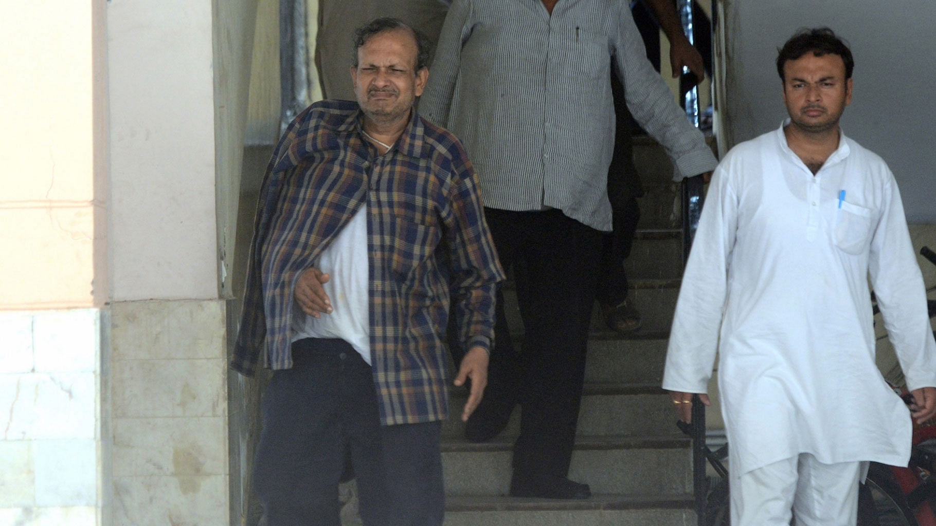 BK Bansal, senior official of the Ministry of Corporate Affairs who was arrested by CBI on bribery charges comes out of his residence in New Delhi on 20 July 2016. (Photo: IANS)