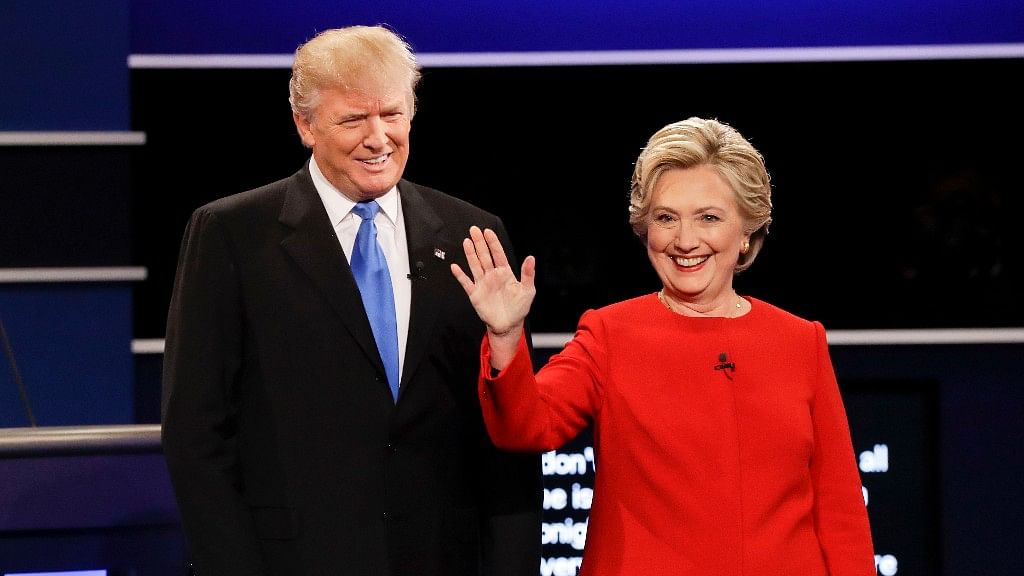 Republican presidential nominee Donald Trump (L) and Democratic presidential nominee Hillary Clinton (R) are introduced during the presidential debate at Hofstra University in Hempstead, NY, Monday, 26 Sept 2016. (Photo: AP)