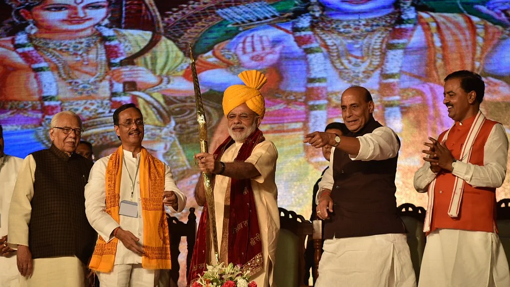 Prime Minister Narendra Modi being welcomed on stage at the Aishbagh Ram Leela in Lucknow. (Photo Courtesy: Press Information Bureau)