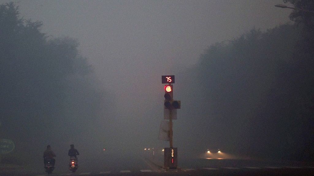 Smog covers Delhi with  pollutants reaching dangerous levels  on Monday morning, a day after Diwali. (Photo: PTI)