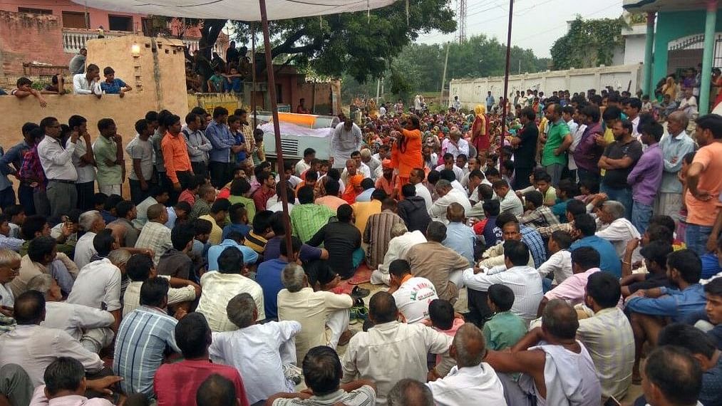 A Martyr’s Death? Villagers Wrap Dadri Accused’s Body in Tricolour