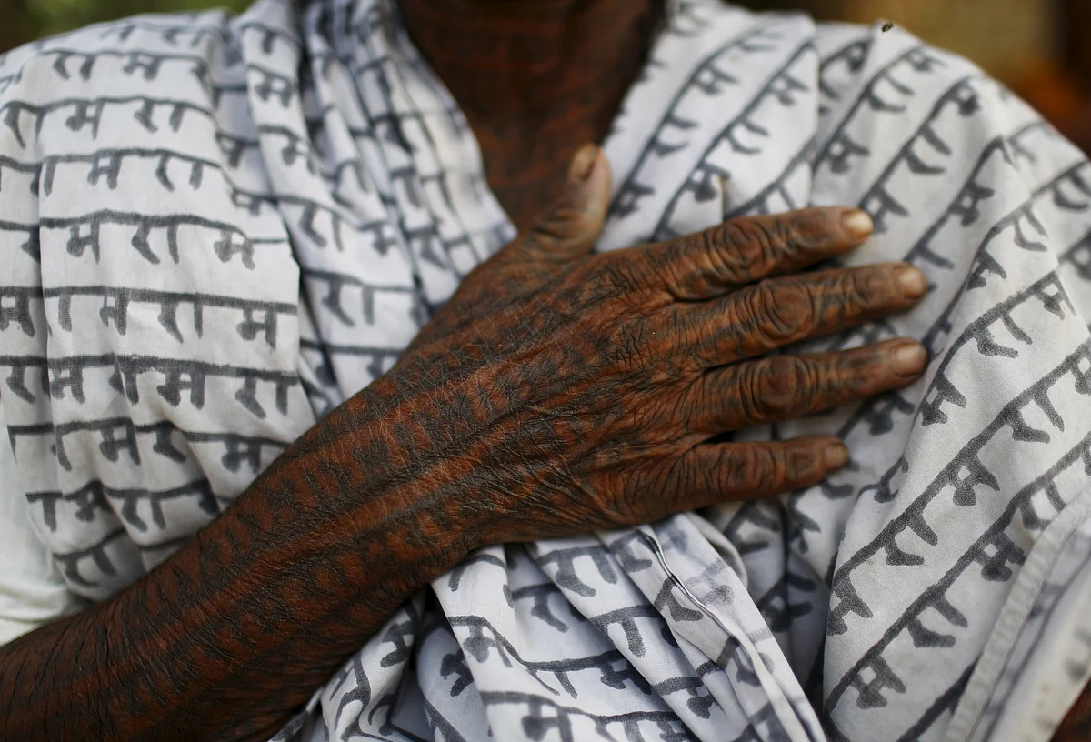 Punai Bai, 75, a follower of Ramnami Samaj, who has tattooed the name of the Hindu god Ram on her entire body. (Photo: Reuters)