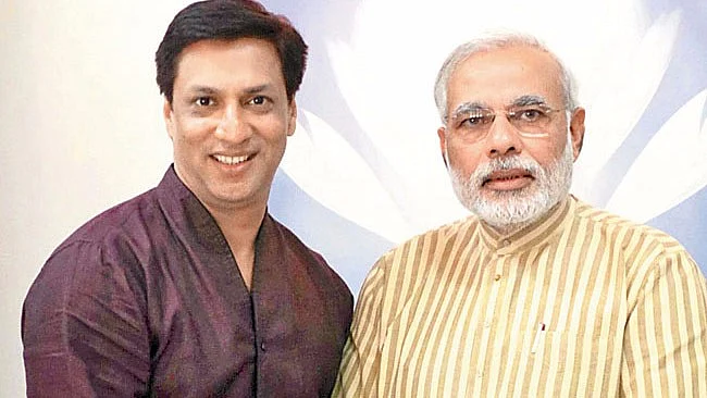Madhur Bhandarkar with PM Modi. (Photo Courtesy: Twitter/<a href="https://twitter.com/imbhandarkar">@imbhandarkar</a>)