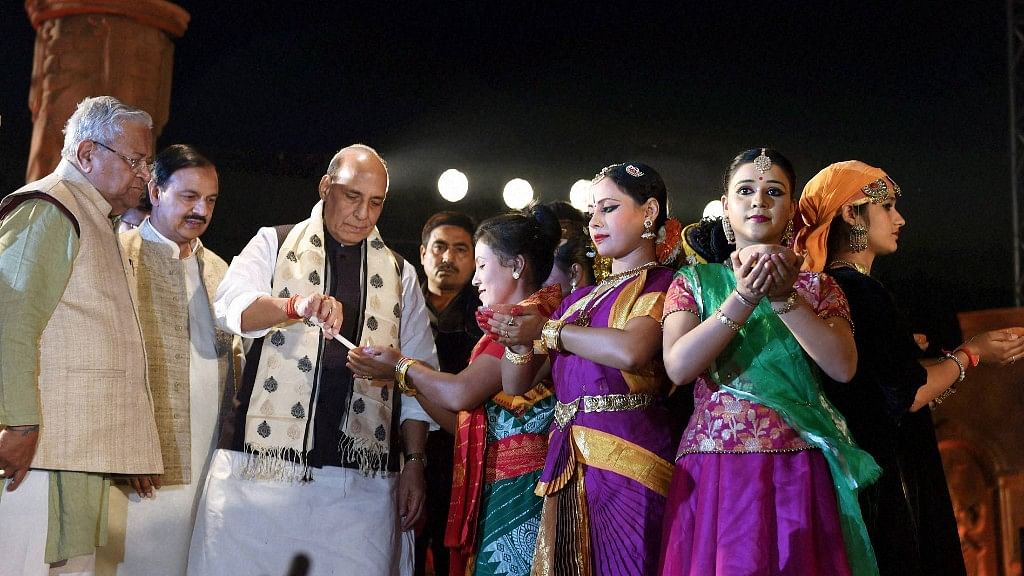 Rajnath Singh lights the lamp to inaugurate “Rashtriya Sanskriti Mahotsav 2016”  in New Delhi. (Photo: PTI)