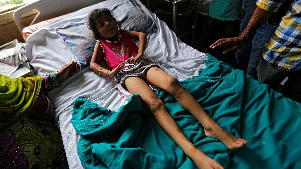 A young girl lies in a hospital in Srinagar, Kashmir. (Photo: Reuters)