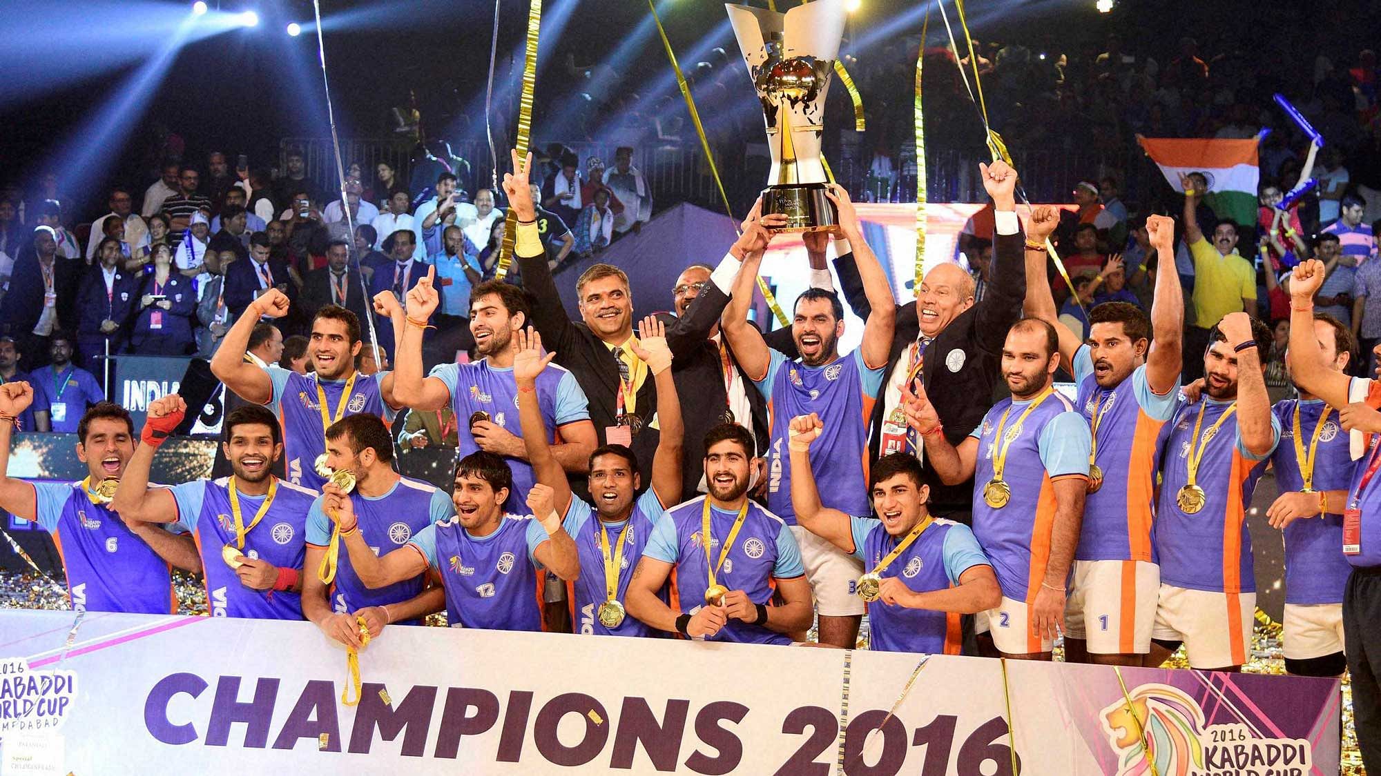 Indian players celebrate with the winning trophy after beating Iran in the final of  the Kabaddi World Cup 2016 in Ahmedabad on Saturday. (Photo: PTI)