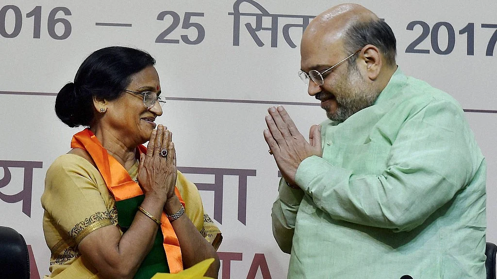 Senior Congress member Rita Bahuguna Joshi with BJP President Amit Shah in October last year. (Photo: PTI)