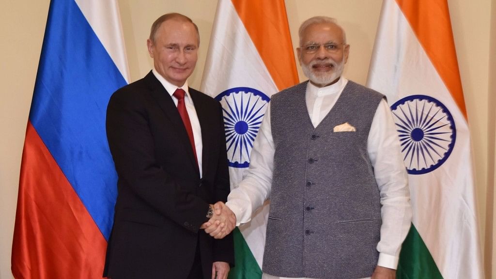 Narendra Modi with Vladimir Putin ahead of the restricted talks between the two nations in Goa on 15 October. (Photo: IANS)