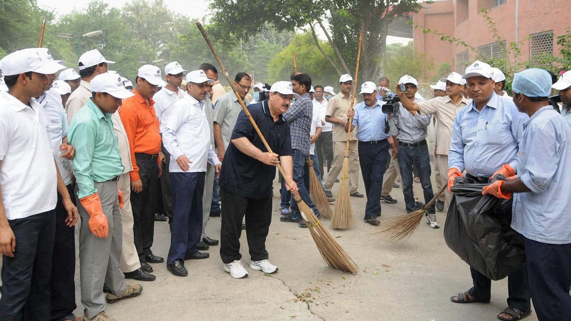 Union Health and Family Welfare Minister, JP Nadda takes part in a Swachh Bharat programme, in New Delhi, on Sunday. (Photo: PTI)