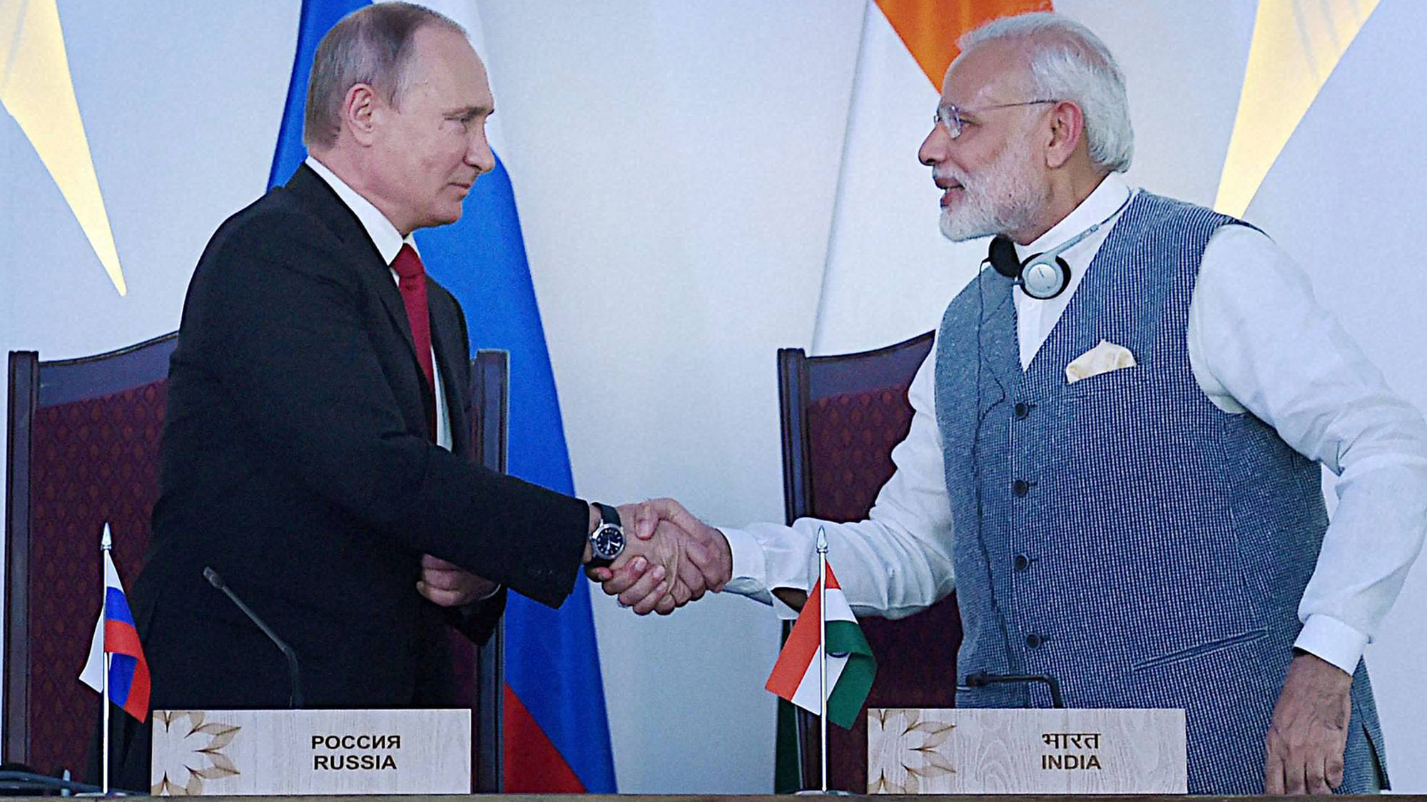 Prime Minister Narendra Modi shakes hands with Russian President Vladimir Putin at the agreement exchange ceremony after the 17th India-Russia annual summit meet in Benaulim, Goa on Saturday. (Photo: PTI)