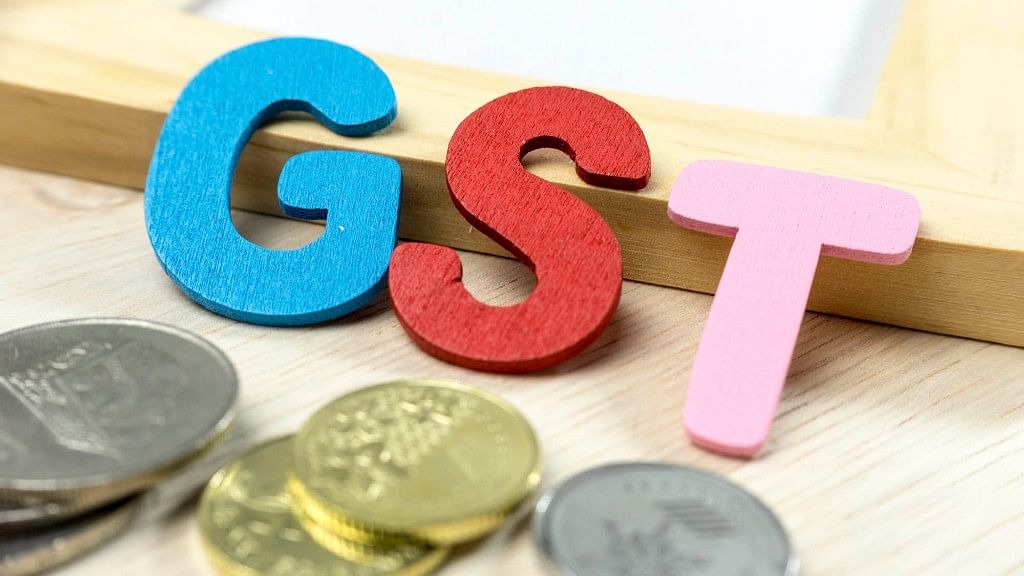 The passage of the GST bill heralds an era of merger of corporate muscle with the government’s power. (Photo: iStock)