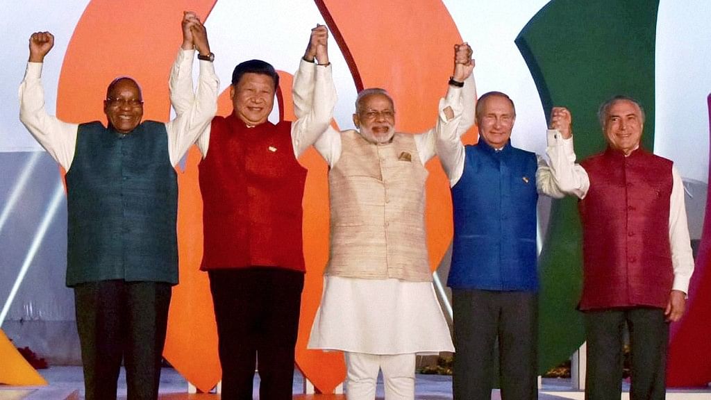 Prime Minister Narendra Modi with other BRICS leaders wearing ethnic jackets before the informal dinner on Saturday, 15 October 2016. (Photo: PTI)