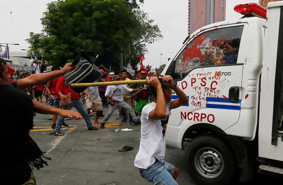 

Video footage shows the van repeatedly ramming the protesters as it drove wildly back and forth.