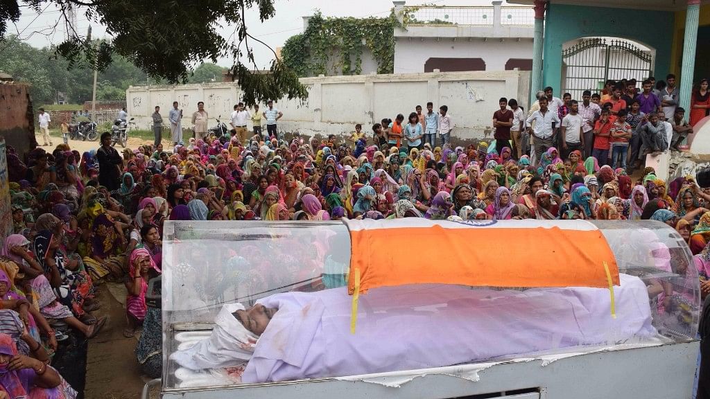 The body was kept in the open community space, placed in a transparent casket, draped in the Indian National Flag. (Photo: IANS)