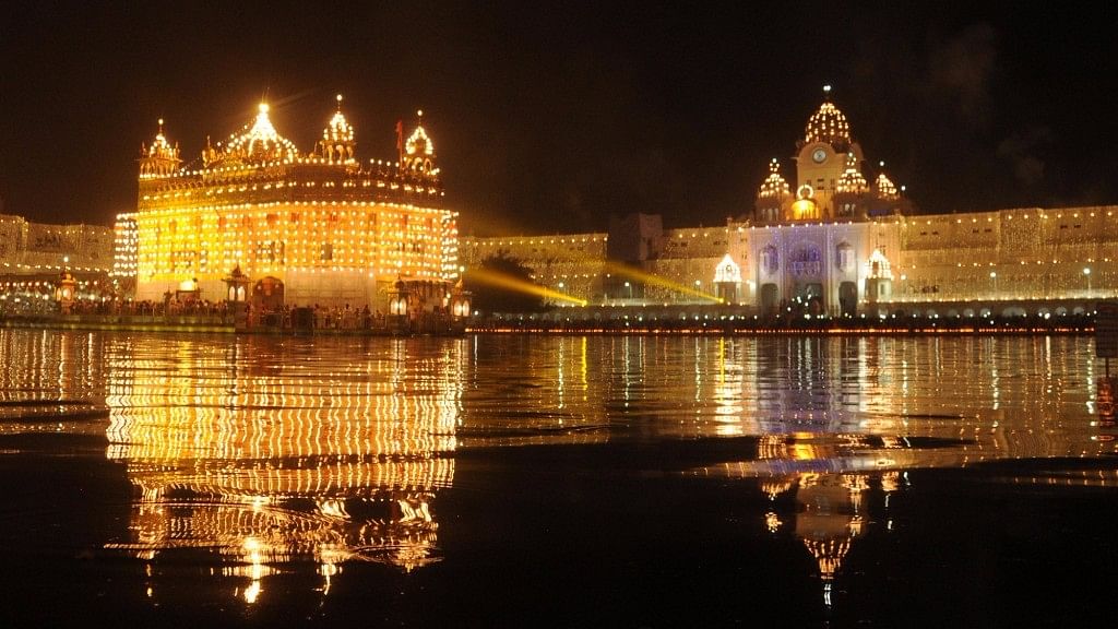 

A view of spectacularly lit Golden Temple on the birth anniversary of the fourth Sikh Guru Ramdas, in Amritsar on  17 October 2016. (Photo: IANS)
