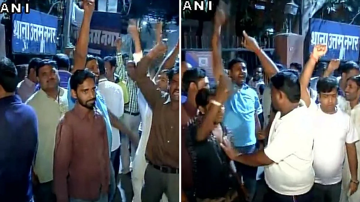 Supporters of AAP MLA Naresh Balyan protest outside Uttam Nagar police station after Balyan was arrested. (Photo: ANI)