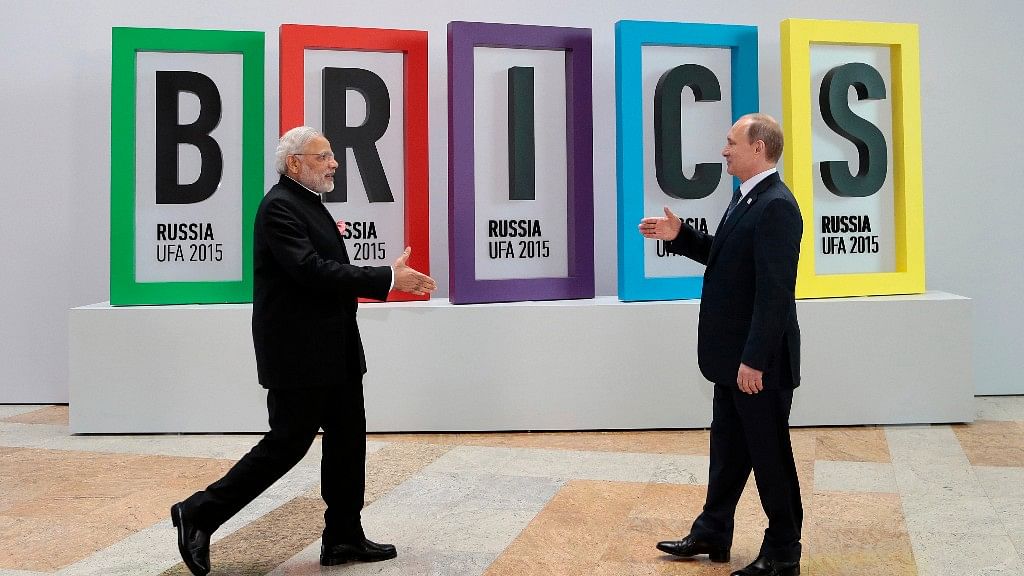 PM Narendra Modi, left, and Russian President Vladimir Putin prepare to shake hands prior to their talks during the BRICS Summit in Russia. Image used for representation only.