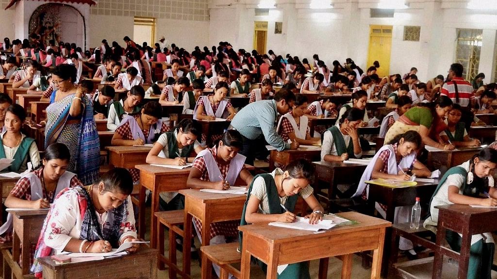 

 Students appear for class 12th Board exams in a school, at Agartala. (Photo: PTI)
