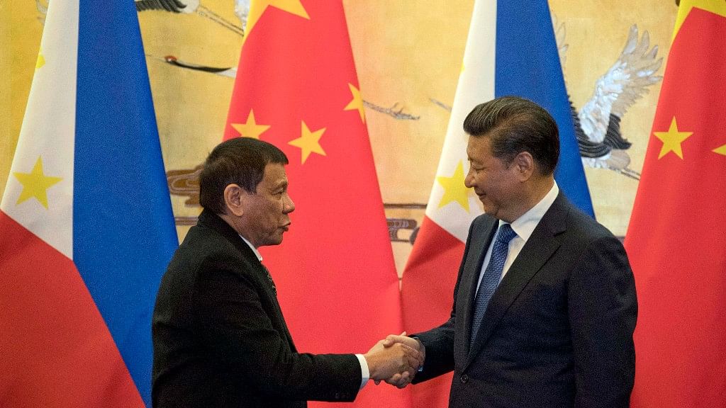 Philippine President Rodrigo Duterte (left) and Chinese President Xi Jinping after a signing ceremony in Beijing on Thursday. (Photo: AP)
