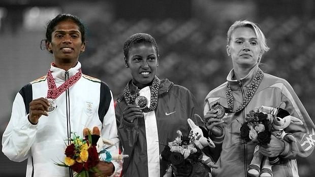 Santhi was stripped of the silver medal she won at the Doha Asian Games because she failed a gender test. (Photo Courtesy: <a href="https://www.facebook.com/athleteshanthi/photos/a.596459117085433.1073741827.596456467085698/596459030418775/?type=3&amp;theater">Facebook/Santhi Soundarajan</a>/Altered by <b>The Quint</b>)