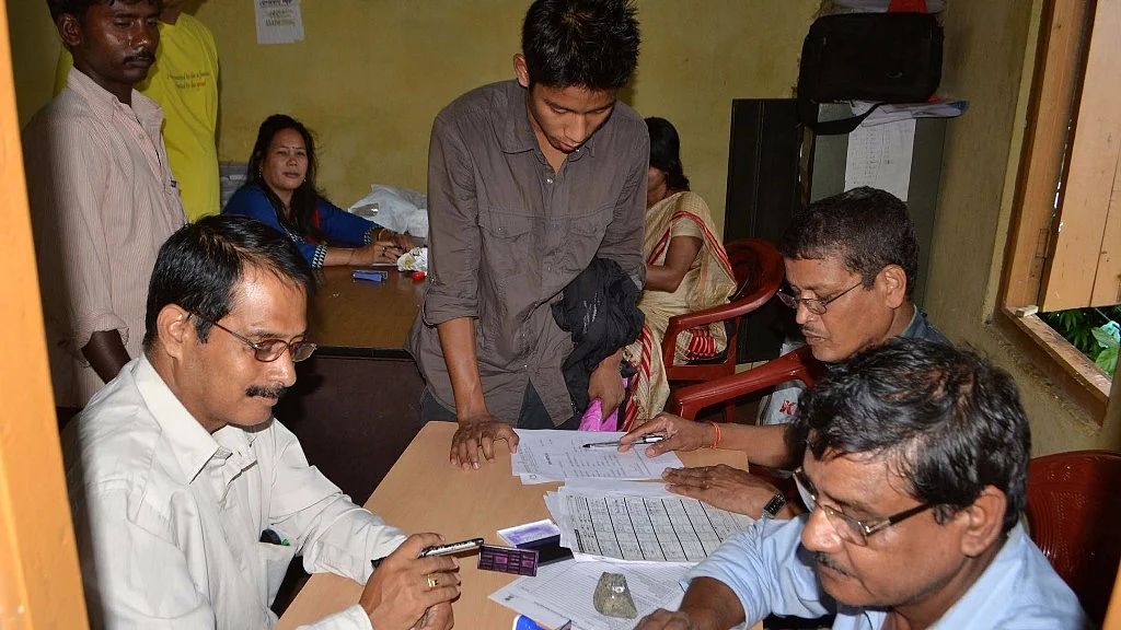 People submit duly filled in National Register of Citizens (NRC) forms on the last day of submission in Guwahati, on 31 August 2015. (Photo: IANS)