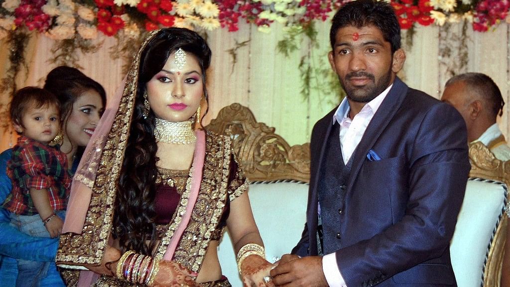 Renowned Indian wrestler Yogeshwar Dutt and Sheetal during their engagement ceremony in Sonipat on Sunday. (Photo: PTI)