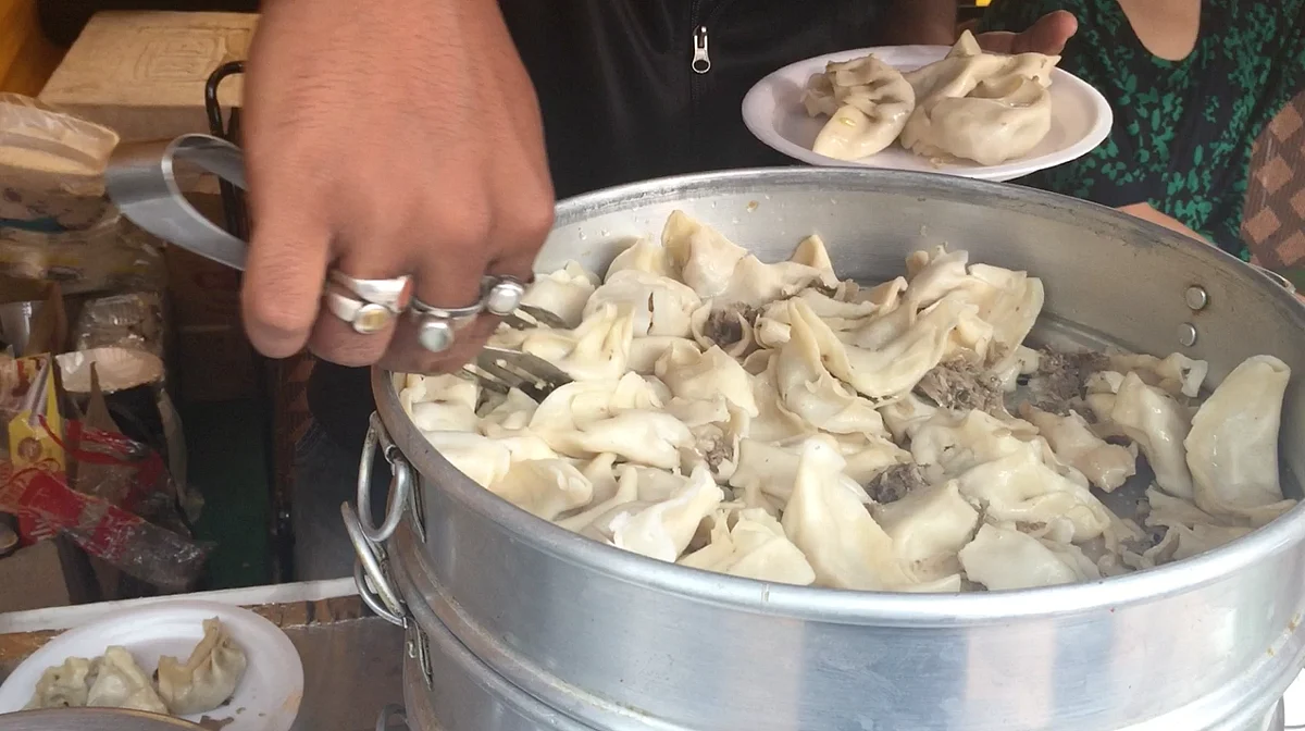 Momos, particularly pork momos, were a scrumptious hit. (Photo: Urmi Bhattacheryya<b>/The Quint</b>)