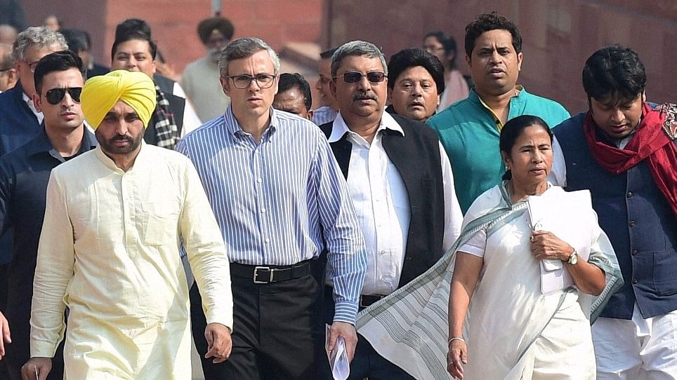 West Bengal Chief Minister Mamata Banerjee leads the march to Rashtrapati Bhavan