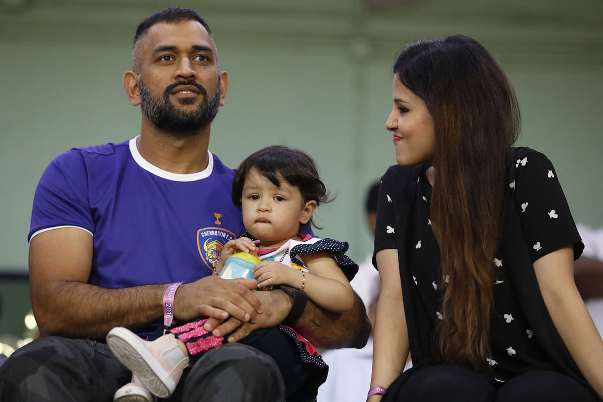 Take a look at Ziva Dhoni enjoying an ISL match with her parents MS Dhoni and Sakshi Dhoni.