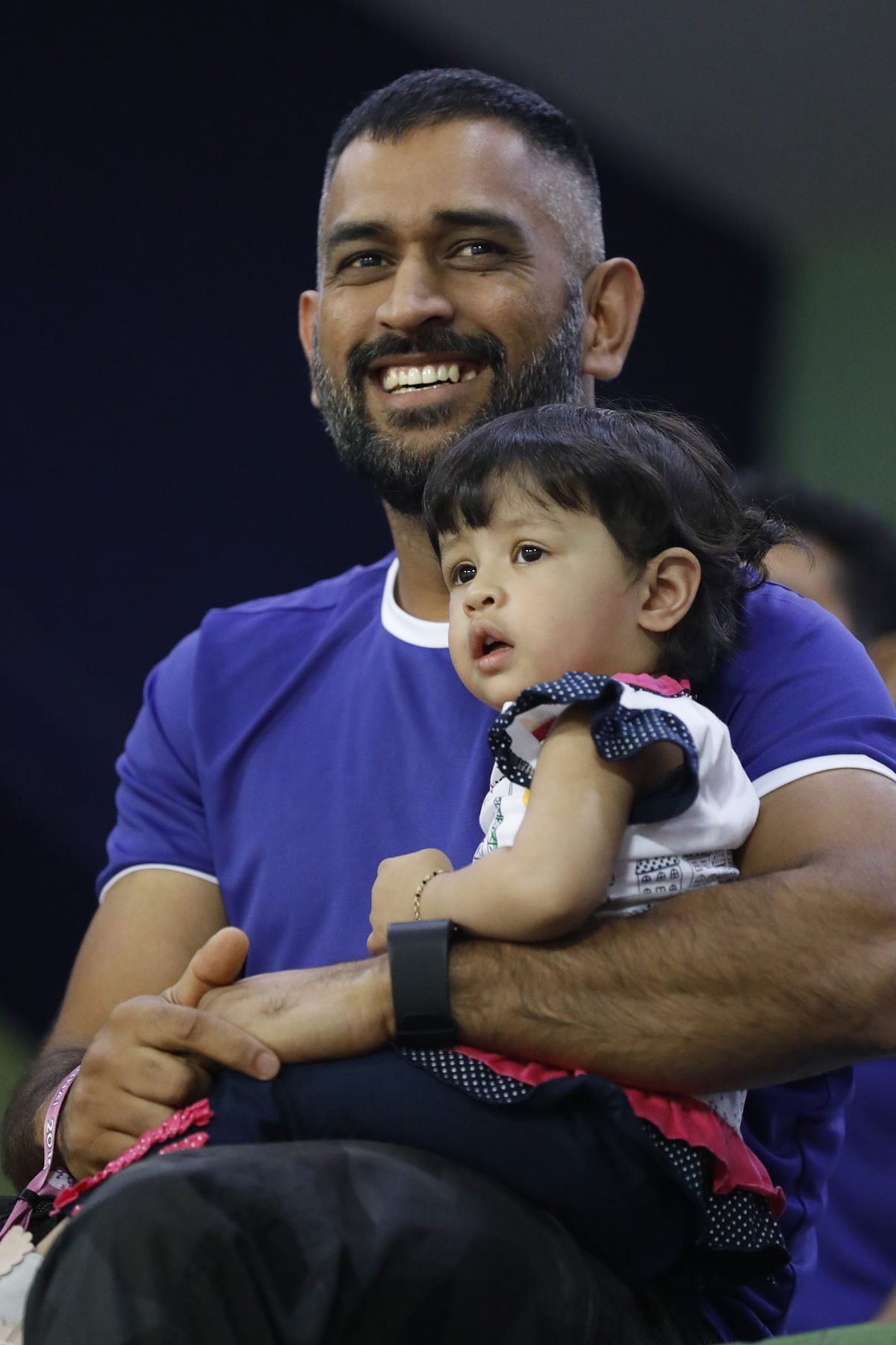 Take a look at Ziva Dhoni enjoying an ISL match with her parents MS Dhoni and Sakshi Dhoni.