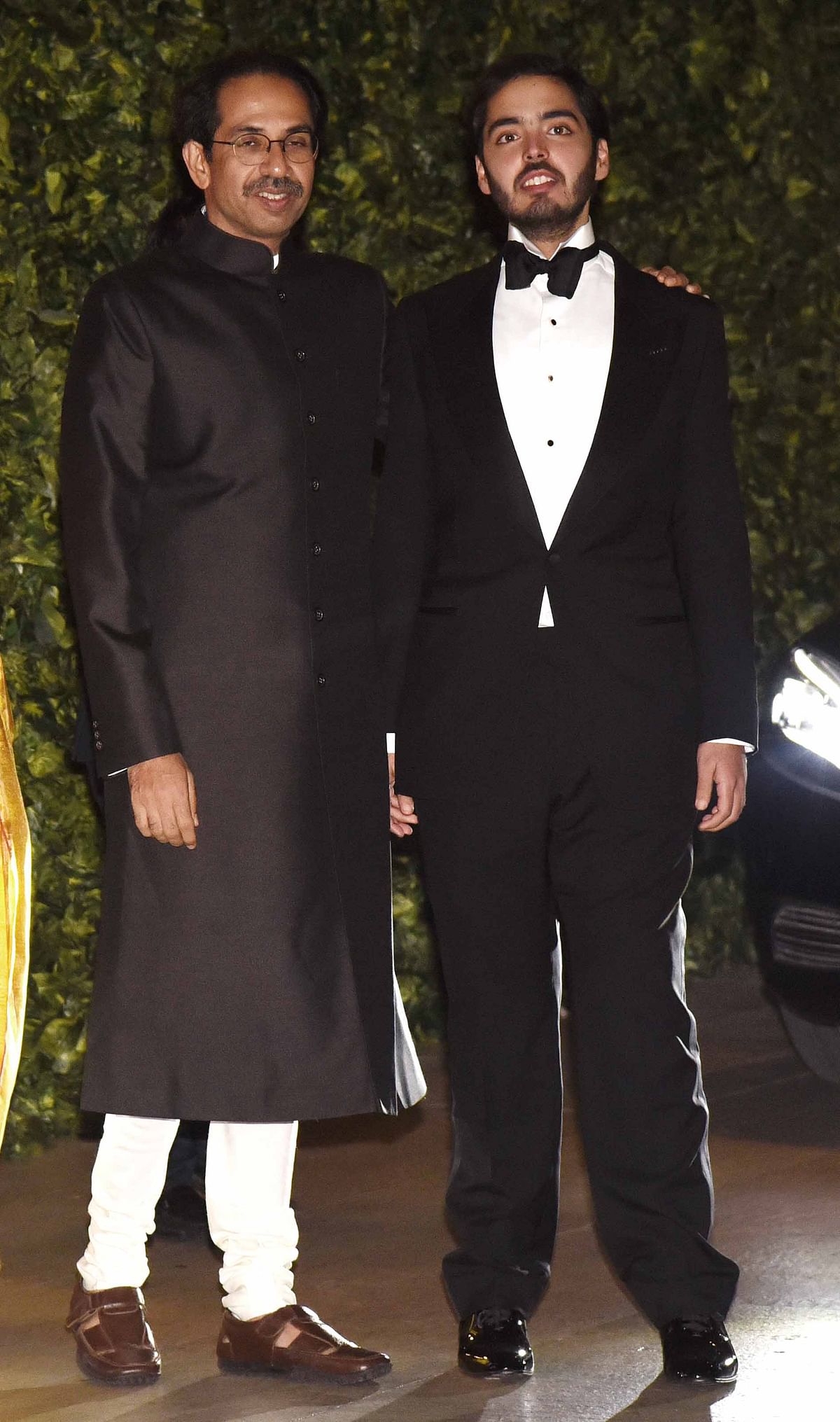 Uddhav Thackeray with Mukesh Ambani’s son. (Photo: Yogen Shah)