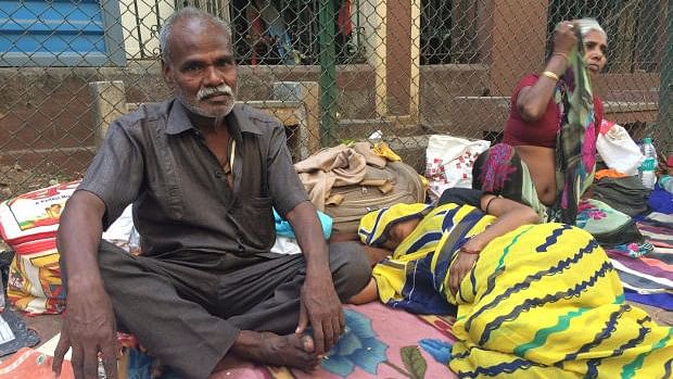 

Mahavir Malhar, 52, from Jharkhand came to Mumbai for his wife’s cancer treatment. Their sons cannot send the couple money because of long lines at banks back home. The couple have no money and are surviving on the hospital’s charitable kitchen. (Photo Courtesy: IndiaSpend)