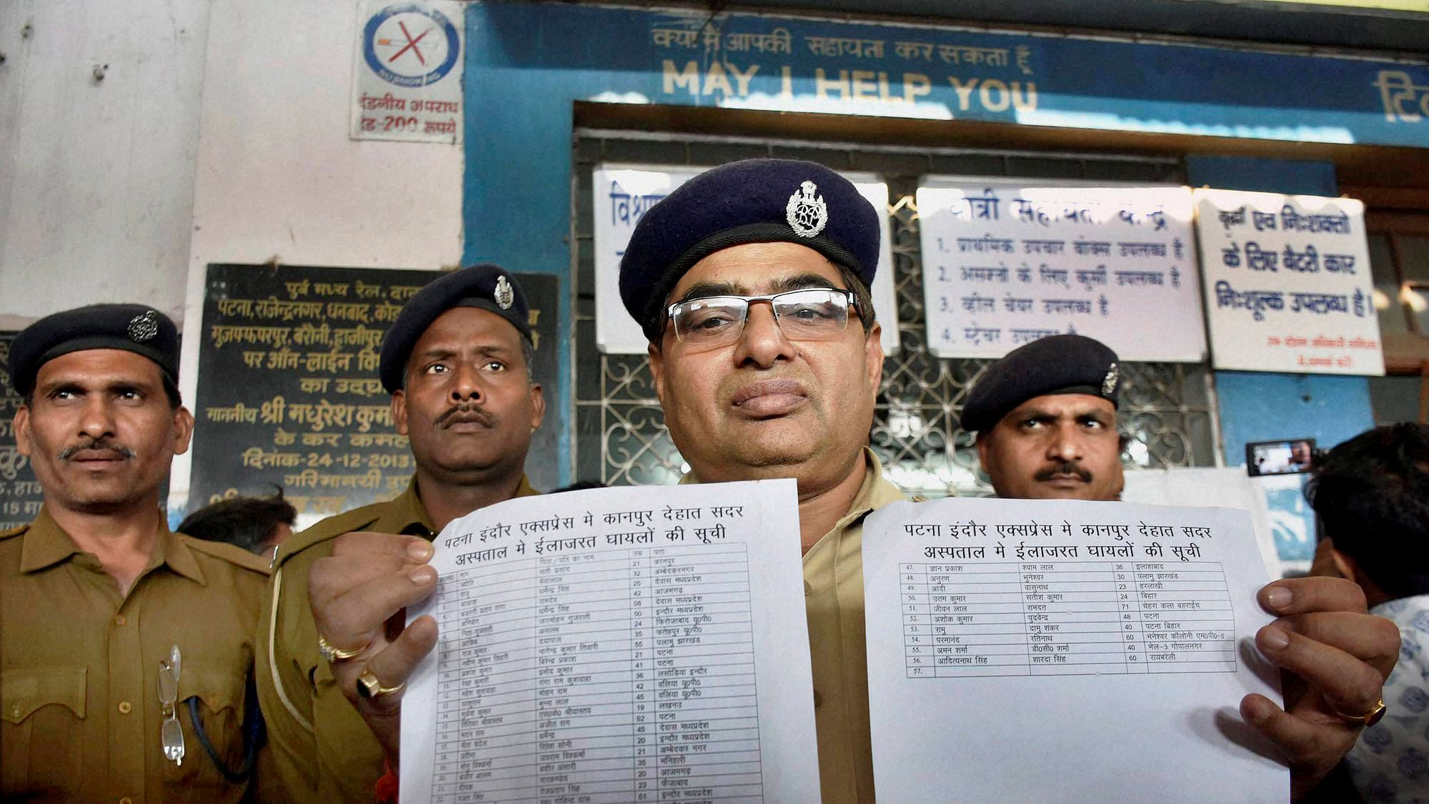 

A Government Railway Police officer shows casualty list of the Indore-Patna Express which derailed near Kanpur. (Photo: PTI)