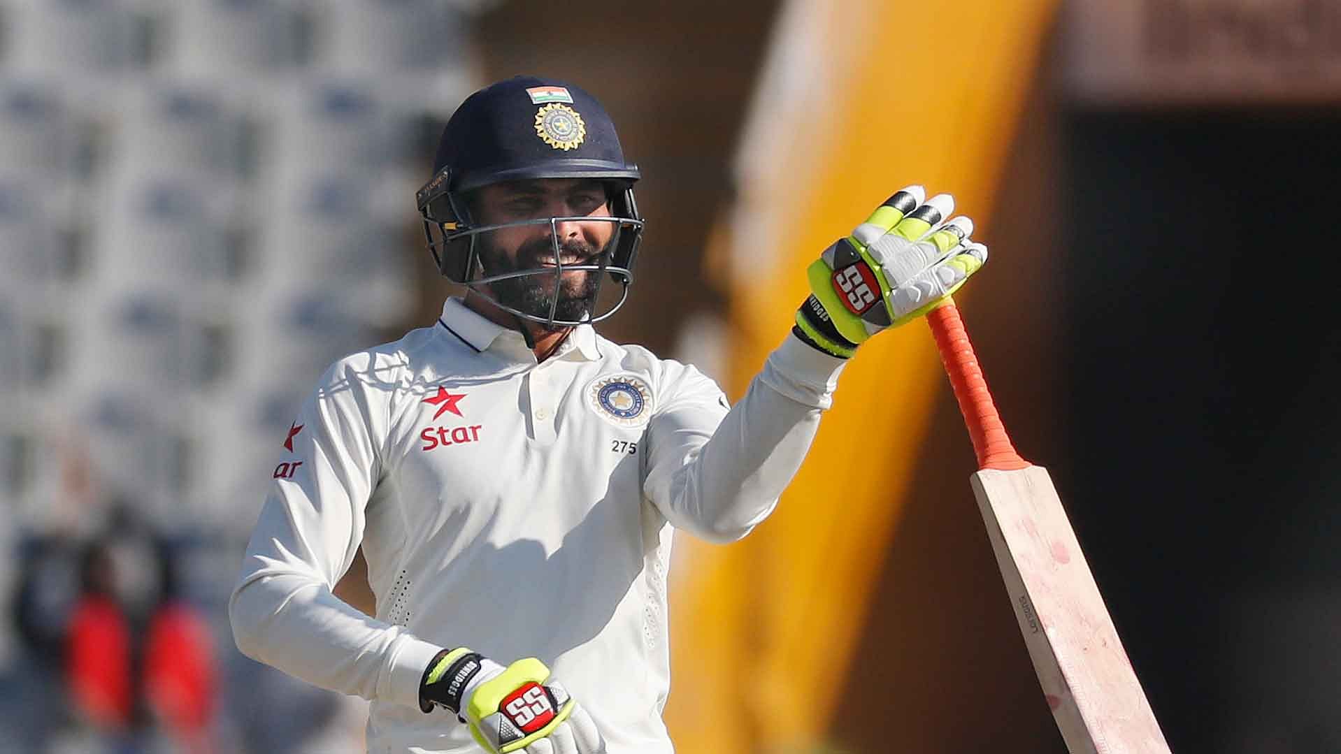 Ravindra Jadeja had Jayant Yadav for company at the crease when he completed his half-century (Photo: AP)