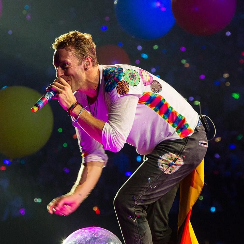 The Coldplay frontman had the Indian flag tucked in his back pocket at one point of the performance. 
