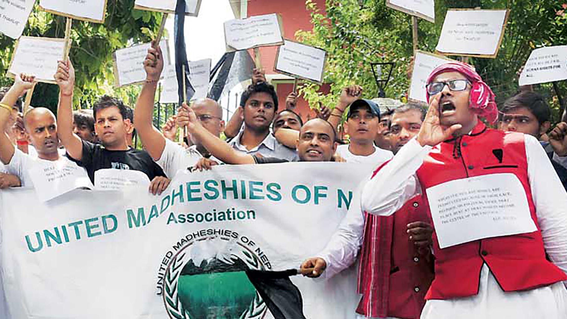 

Members of the United Madhesis of Nepal Association protest outside the Nepal embassy in New Delhi in April 2015. (Photo: PTI)