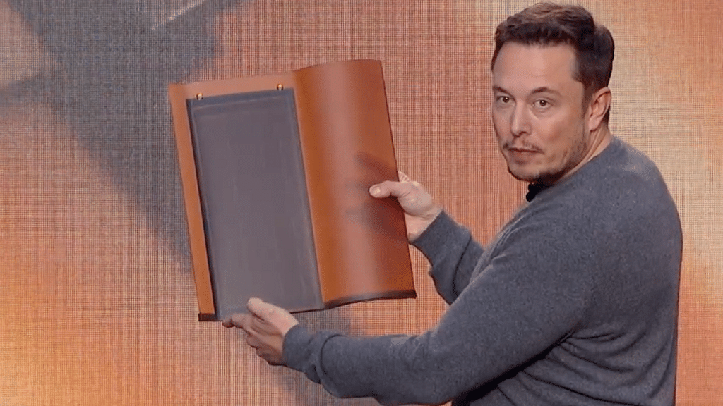 Elon Musk demonstrates some of his solar tiles. (Photo Courtesy: Screenshot from Tesla Video)