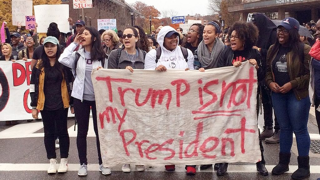People protest at the University of Connecticut campus after the election of Republican Donald Trump as President . (Photo: AP)