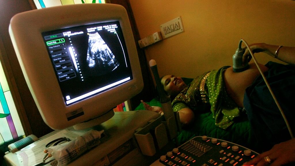 Nayna Patel, an Indian gynaecologist, carries out an ultrasound examination. (Photo: Arko Datta/Reuters)