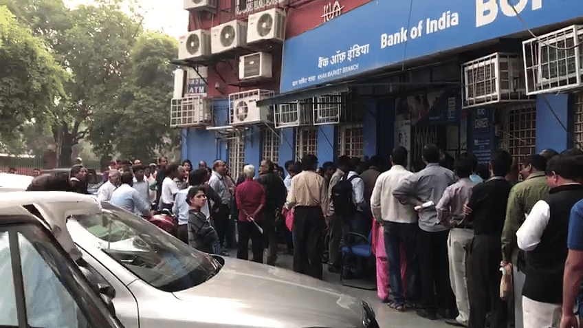 File image of  customers waiting outside ATMs (Image used for representation)&nbsp;