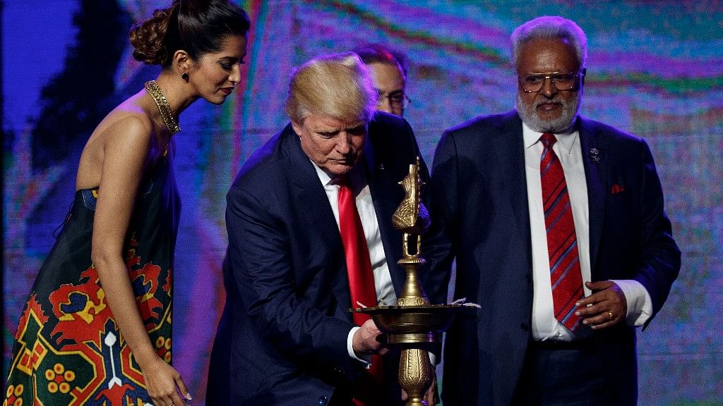 

Republican presidential candidate Donald Trump lights a diya before delivering remarks to the Republican Hindu Coalition. (Photo:AP)