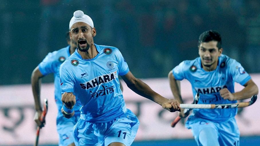 The Indian players celebrate after beating Belgium in the Junior Hockey World Cup final on Sunday. (Photo: PTI)