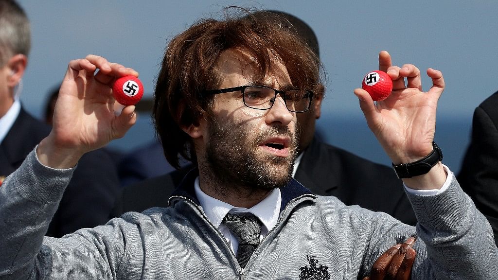 Simon Brodkin (aka Lee Nelson), a standup comedian hijacked Donald Trump’s election rally by handing out golf balls with swastika signs earlier in June 2016. (Photo: Reuters)
