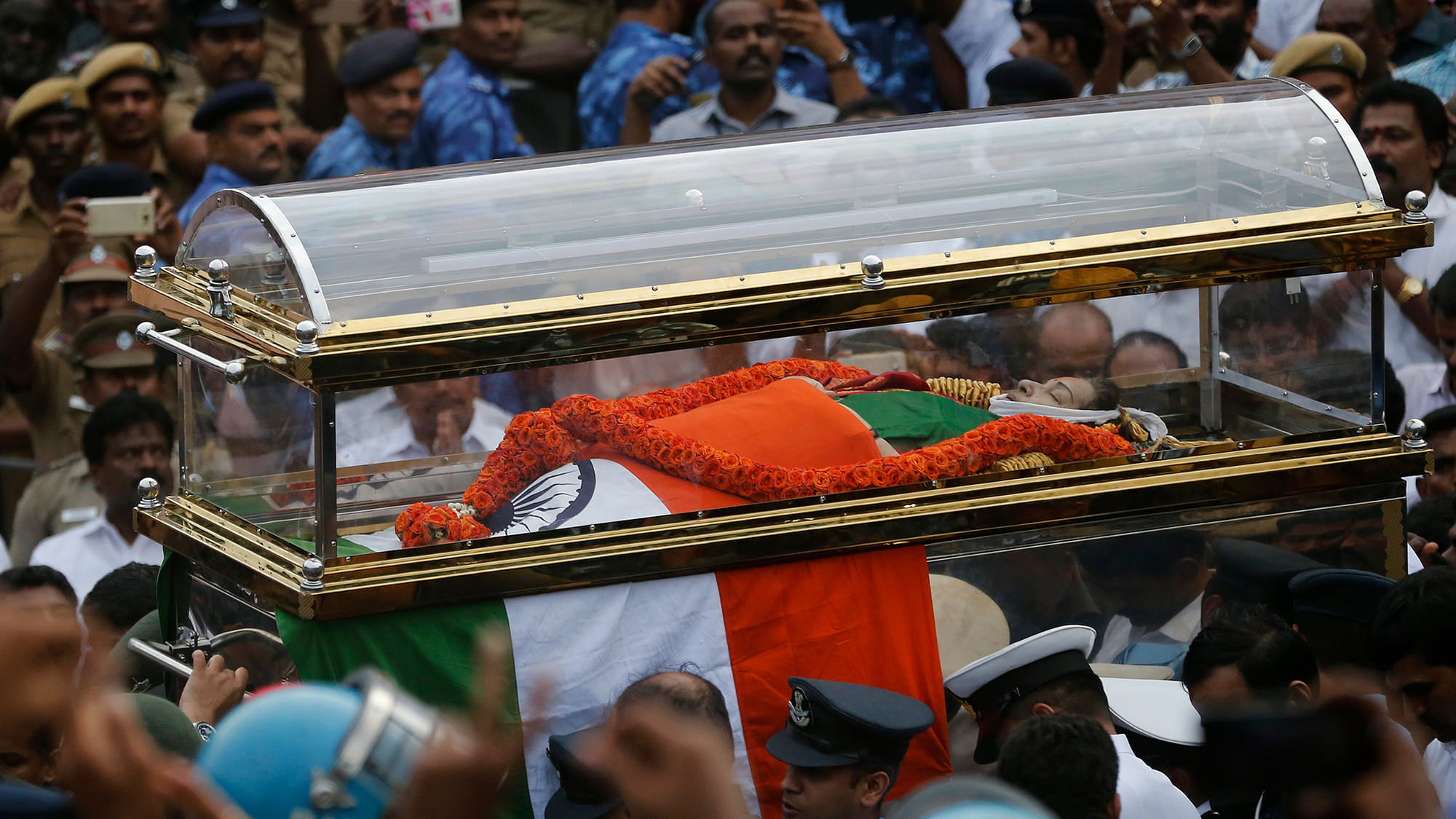 Jayalalithaa’s mortal remains being taken to MGR Memorial in Chennai on Tuesday. (Photo Courtesy: AP)